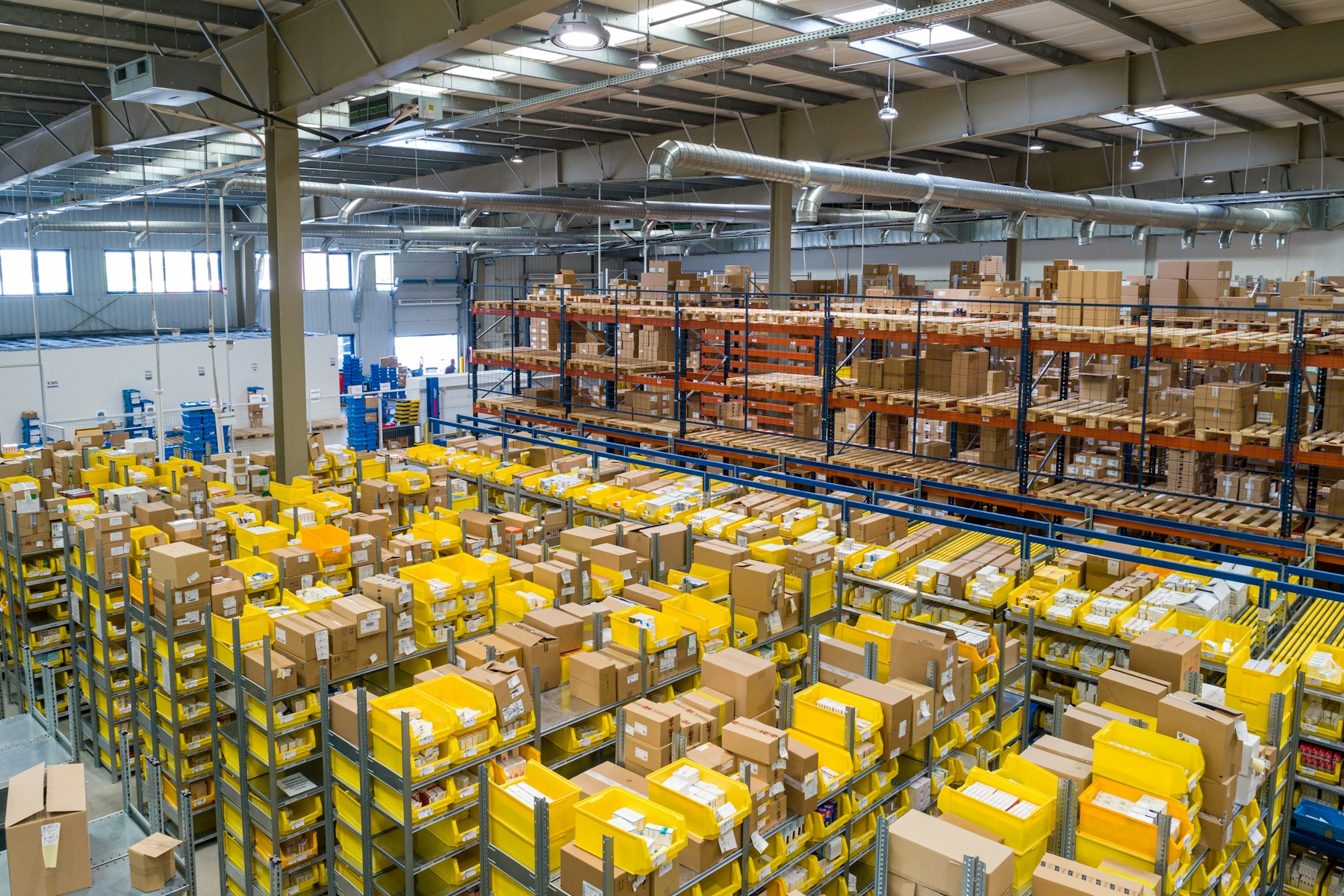 Packages moving through a modern logistics facility